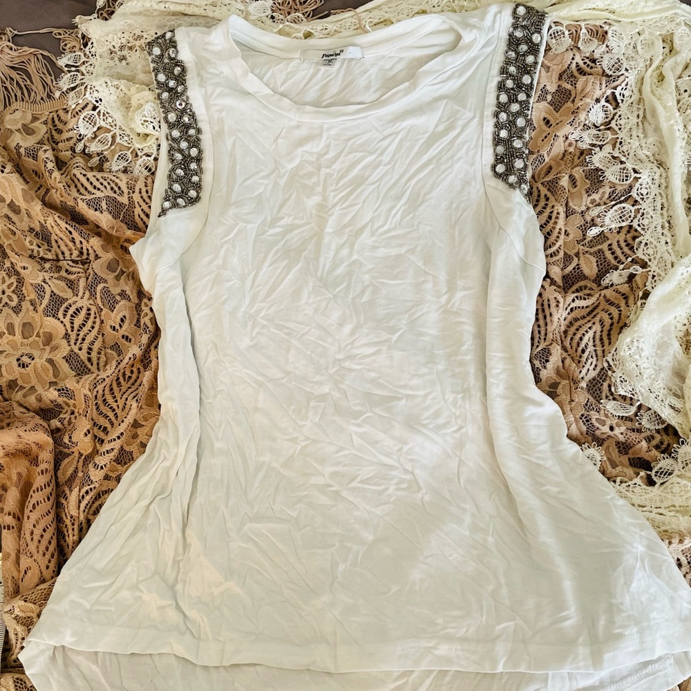 White sleeve embellished top